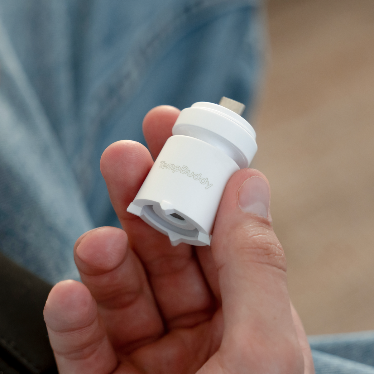 TempBuddy USB-C connector held in hand